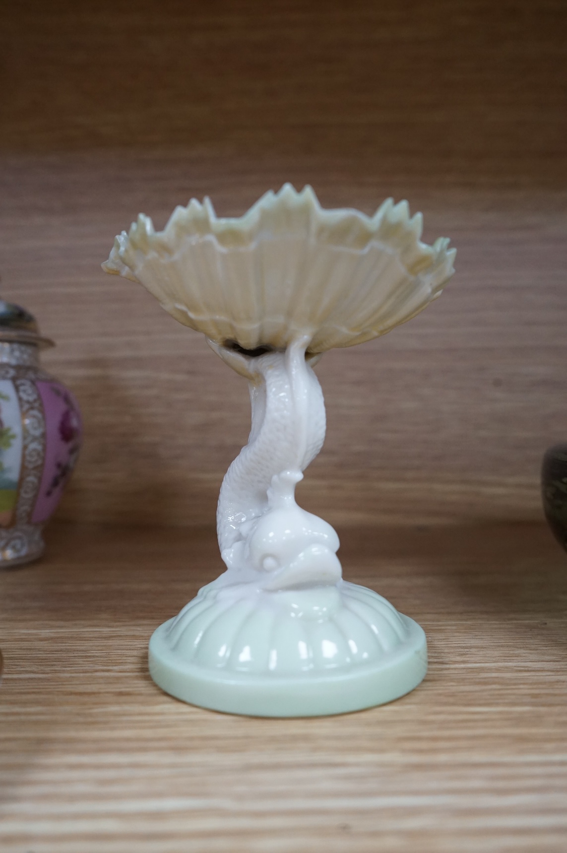 A Worcester butterfly handled cup and saucer and four other items, together with Royal Crown Derby, Dresden and Coalport items. (9). Tallest 13 cm